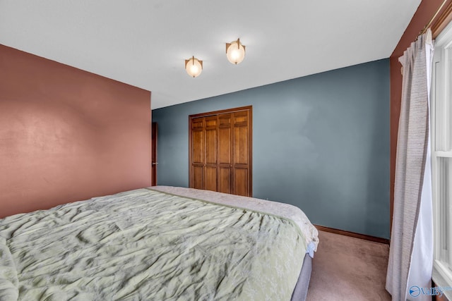 carpeted bedroom featuring a closet