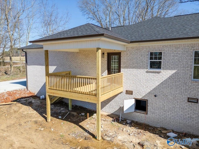 exterior space featuring a wooden deck