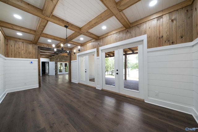 691 County Road 106, Leesburg, AL 35983 - unfurnished living room with french doors, wood walls, coffered ceiling, recessed lighting, and dark wood-style flooring