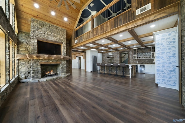 691 County Road 106, Leesburg, AL 35983 - unfurnished living room featuring a fireplace, high vaulted ceiling, wood finished floors, recessed lighting, and wood ceiling