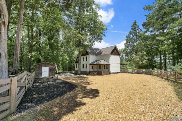 691 County Road 106, Leesburg, AL 35983 - fenced backyard with a storage unit
