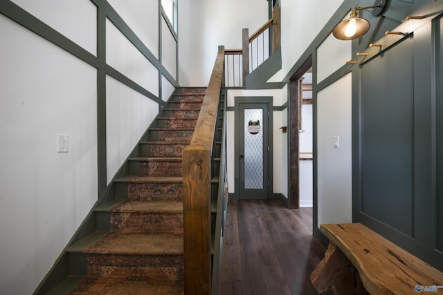 691 County Road 106, Leesburg, AL 35983 - staircase with wood finished floors and a towering ceiling