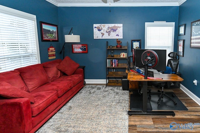 office space with wood-type flooring and crown molding