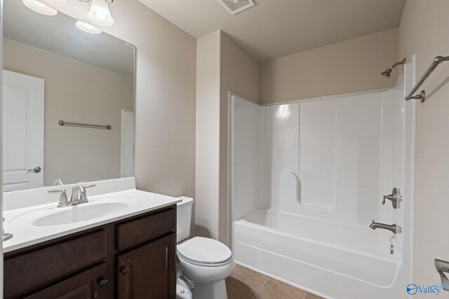 unfurnished bedroom featuring ensuite bathroom, light colored carpet, and ceiling fan