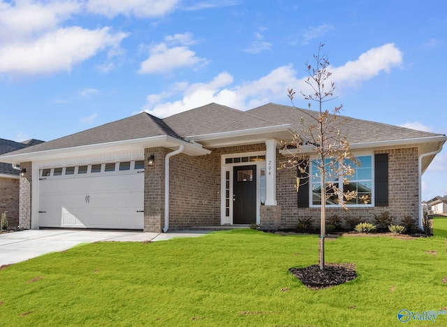 ranch-style house featuring a garage and a front yard