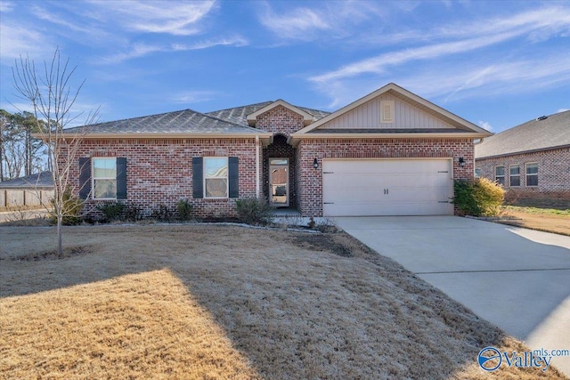 ranch-style house featuring a garage and a front lawn