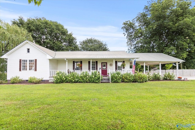 single story home with metal roof, a porch, crawl space, and a front yard