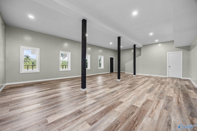 basement featuring light hardwood / wood-style flooring