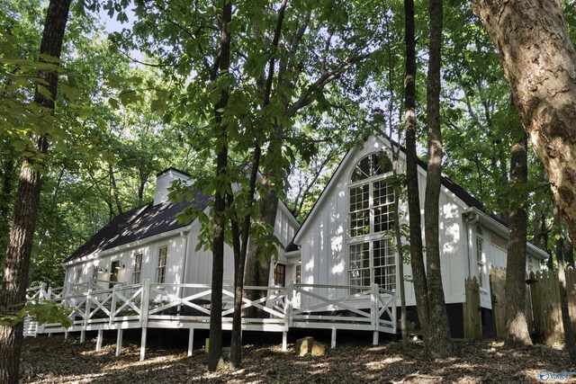 rear view of property with a deck