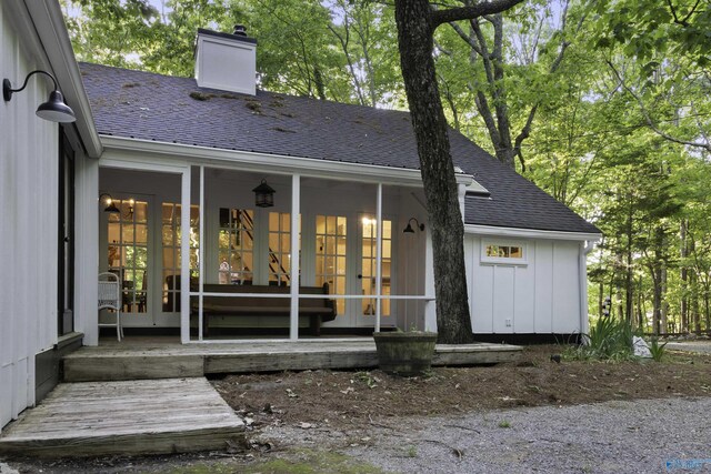 back of house featuring french doors