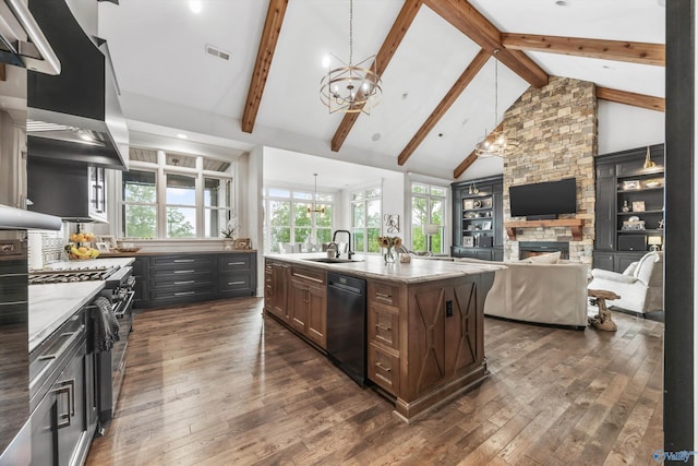 27 Watson Grande Way, Owens Cross Roads, AL 35763 - kitchen with black dishwasher, a chandelier, dark wood-style floors, a stone fireplace, and beam ceiling