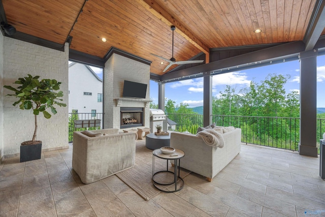 27 Watson Grande Way, Owens Cross Roads, AL 35763 - view of patio / terrace with a fireplace