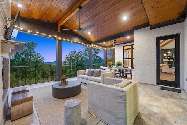 27 Watson Grande Way, Owens Cross Roads, AL 35763 - patio terrace at dusk with outdoor lounge area