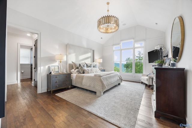 27 Watson Grande Way, Owens Cross Roads, AL 35763 - bedroom with a chandelier, lofted ceiling, dark wood-style floors, and baseboards