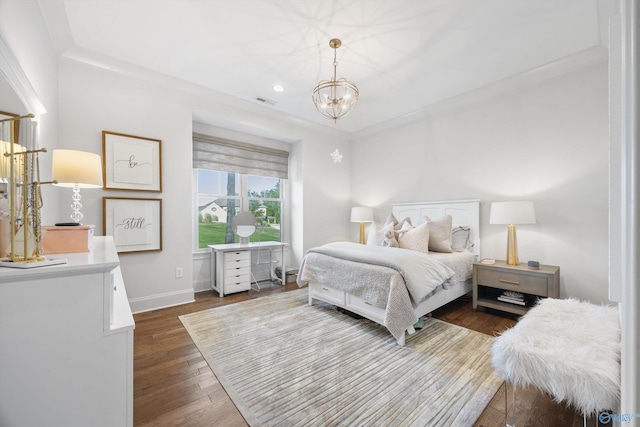 27 Watson Grande Way, Owens Cross Roads, AL 35763 - bedroom featuring a chandelier, dark wood-type flooring, baseboards, and recessed lighting