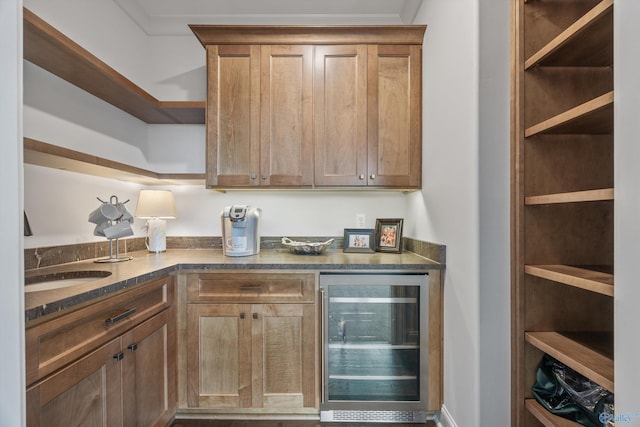 27 Watson Grande Way, Owens Cross Roads, AL 35763 - indoor dry bar with beverage cooler and crown molding