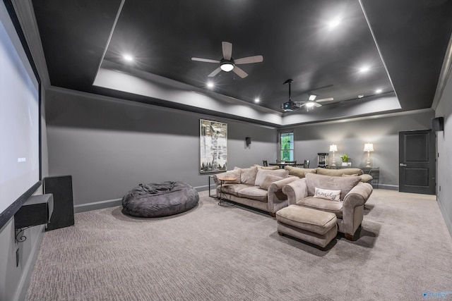 27 Watson Grande Way, Owens Cross Roads, AL 35763 - carpeted home theater featuring a tray ceiling, a ceiling fan, baseboards, and recessed lighting