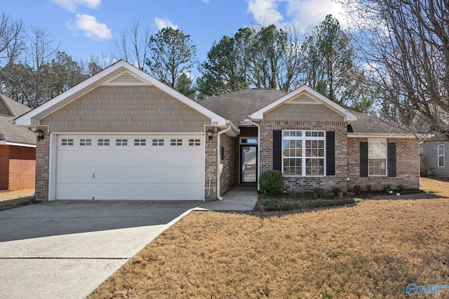 ranch-style home featuring driveway, roof with shingles, a front lawn, a garage, and brick siding