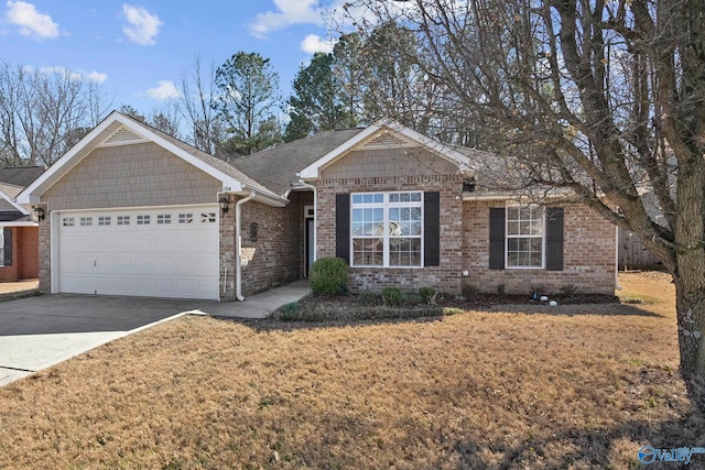 ranch-style house with brick siding, an attached garage, concrete driveway, and a front yard