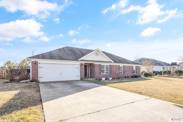 ranch-style home featuring a garage and a front lawn