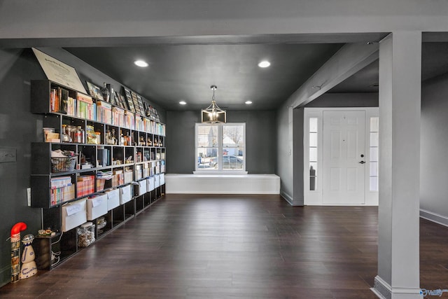 entrance foyer featuring dark hardwood / wood-style floors