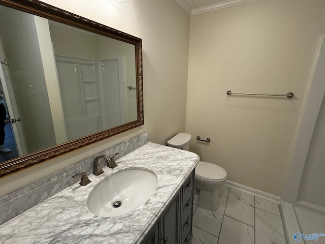 bathroom with vanity, toilet, crown molding, and walk in shower