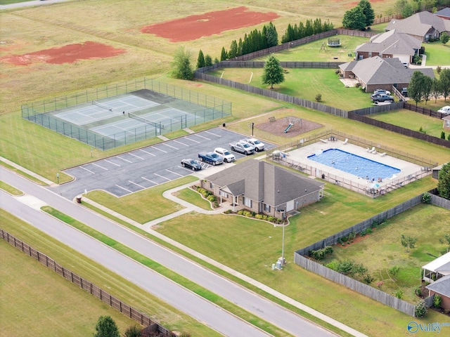 birds eye view of property with a rural view