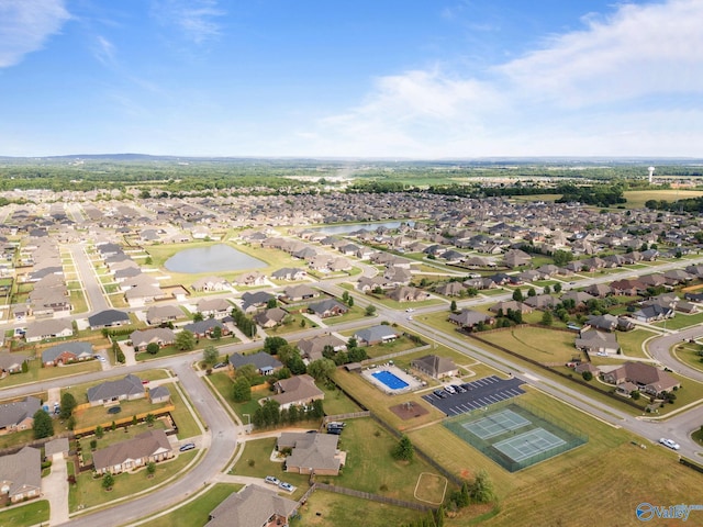 bird's eye view with a water view and a residential view