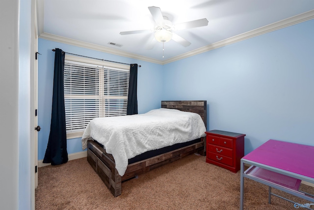 bedroom featuring carpet, ceiling fan, and crown molding