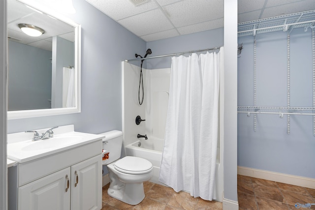 full bathroom featuring shower / tub combo, vanity, toilet, and a paneled ceiling