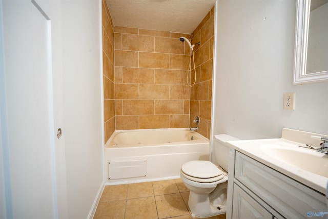 full bathroom with vanity, a textured ceiling, tiled shower / bath combo, and toilet