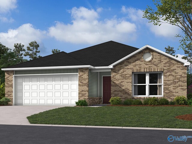 view of front of house featuring a garage and a front yard