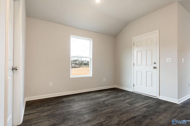 4016 Sherri St SW, Decatur, AL 35603 - empty room with dark wood-type flooring and vaulted ceiling