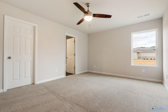 4016 Sherri St SW, Decatur, AL 35603 - unfurnished bedroom with ceiling fan and carpet flooring