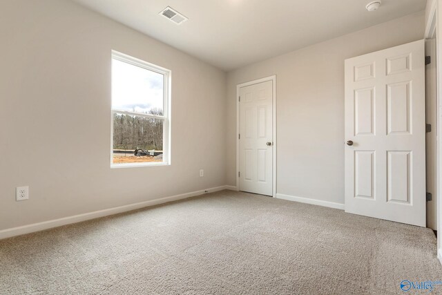 4016 Sherri St SW, Decatur, AL 35603 - unfurnished bedroom featuring carpet floors
