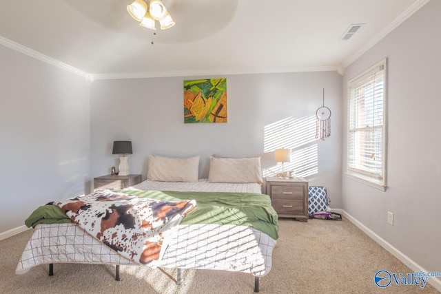 bedroom featuring visible vents, carpet, and ornamental molding