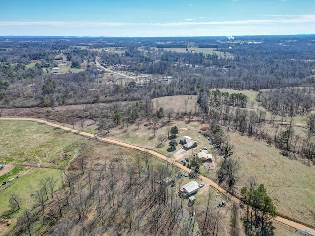 birds eye view of property with a rural view