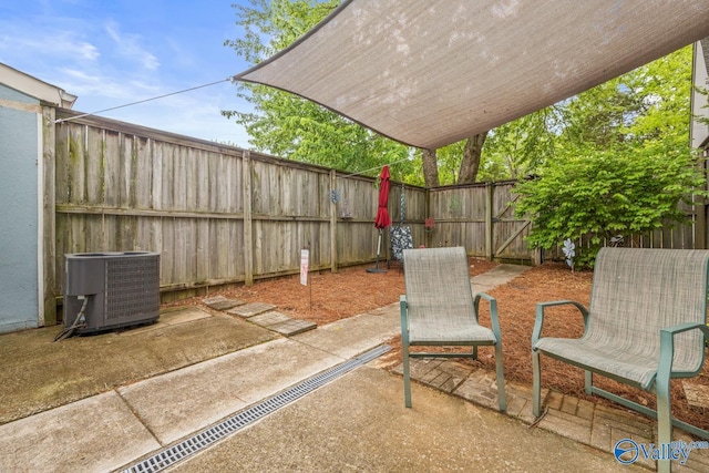 2823 Wynterhall Rd, Huntsville, AL 35803 - view of patio / terrace featuring central AC and a fenced backyard