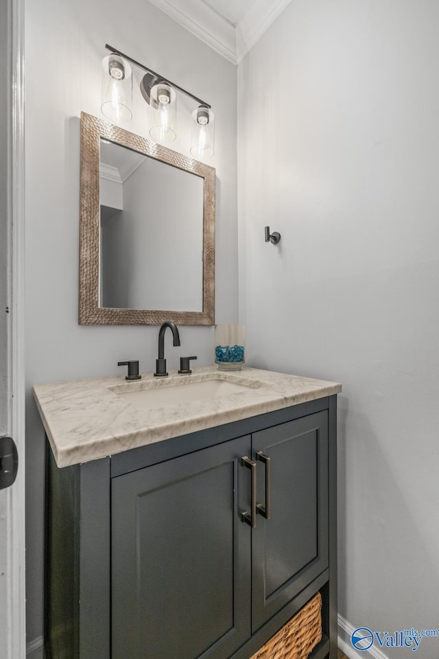 2823 Wynterhall Rd, Huntsville, AL 35803 - bathroom with baseboards, vanity, and crown molding