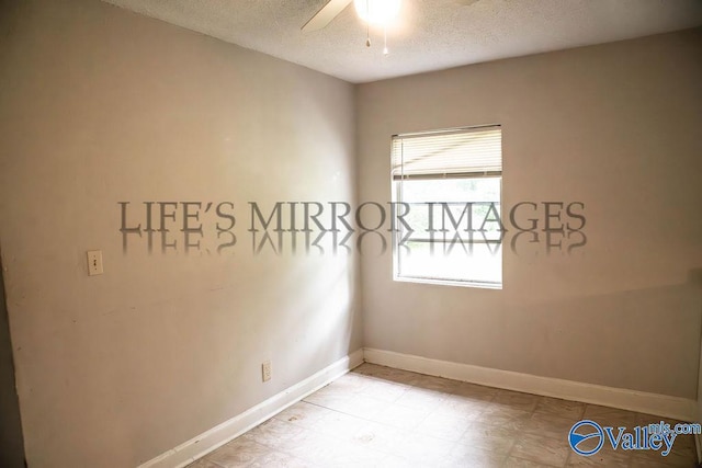 525 Quincy St, Scottsboro, AL 35768 - unfurnished room featuring a ceiling fan, a textured ceiling, and baseboards