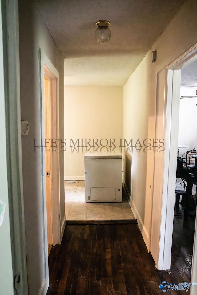 525 Quincy St, Scottsboro, AL 35768 - hallway featuring wood-type flooring and baseboards
