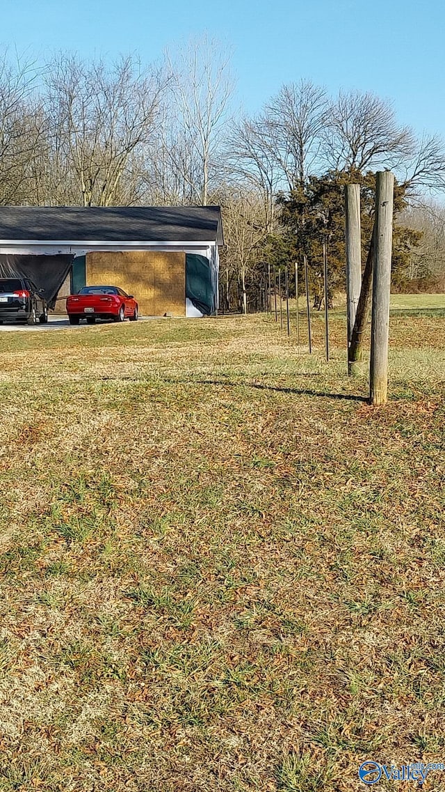 view of yard featuring a carport