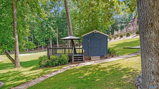 view of outbuilding featuring a lawn