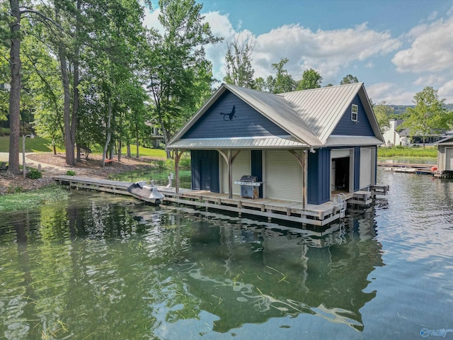 dock area with a water view