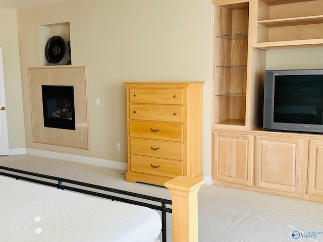 unfurnished bedroom featuring light colored carpet