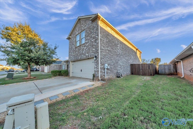 view of property exterior with a garage and a lawn