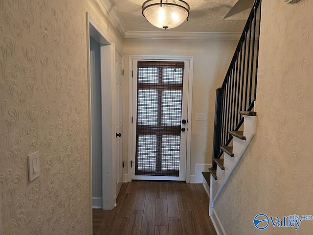 doorway with stairs, crown molding, a textured ceiling, and wood finished floors