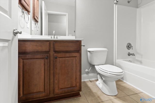 full bathroom featuring tile patterned floors, toilet, vanity, and tub / shower combination