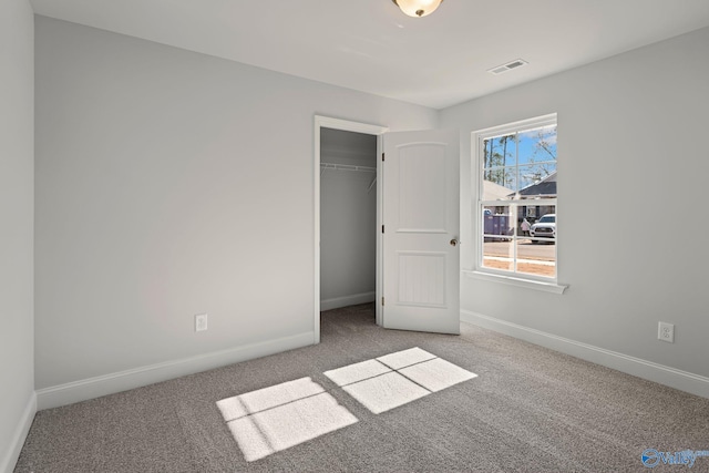 15354 Springbrook Trce, Athens, AL 35611 - unfurnished bedroom with a closet, carpet flooring, baseboards, and visible vents