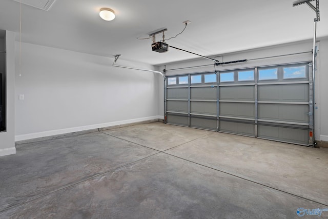 15354 Springbrook Trce, Athens, AL 35611 - garage featuring baseboards and a garage door opener